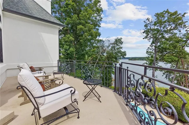 a bathroom with a sink toilet and a mirror