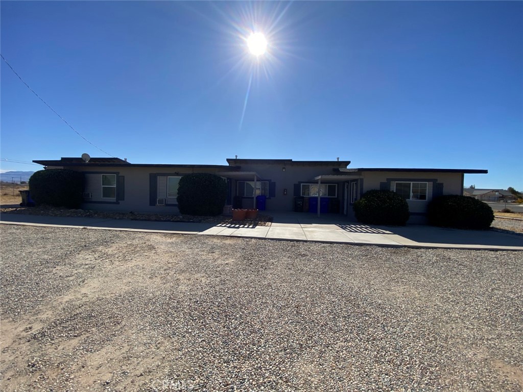 13193 Navajo Road, Unit 3 Apple Valley, CA 92308 - Photo 1 of 17 a view of a terrace