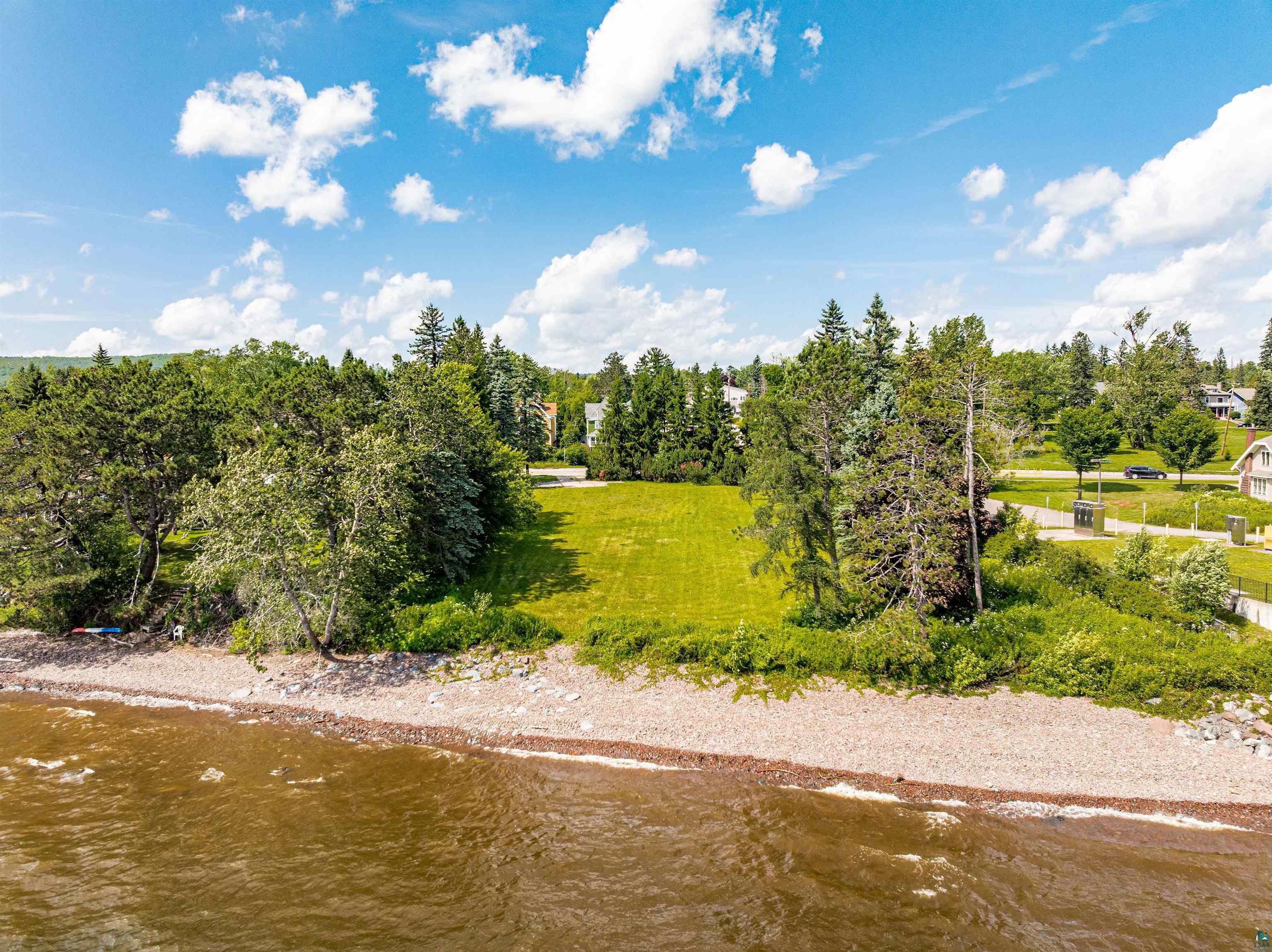5918 London Road Duluth, MN 55804 - Photo 6 of 10 View of wooded area featuring a water view