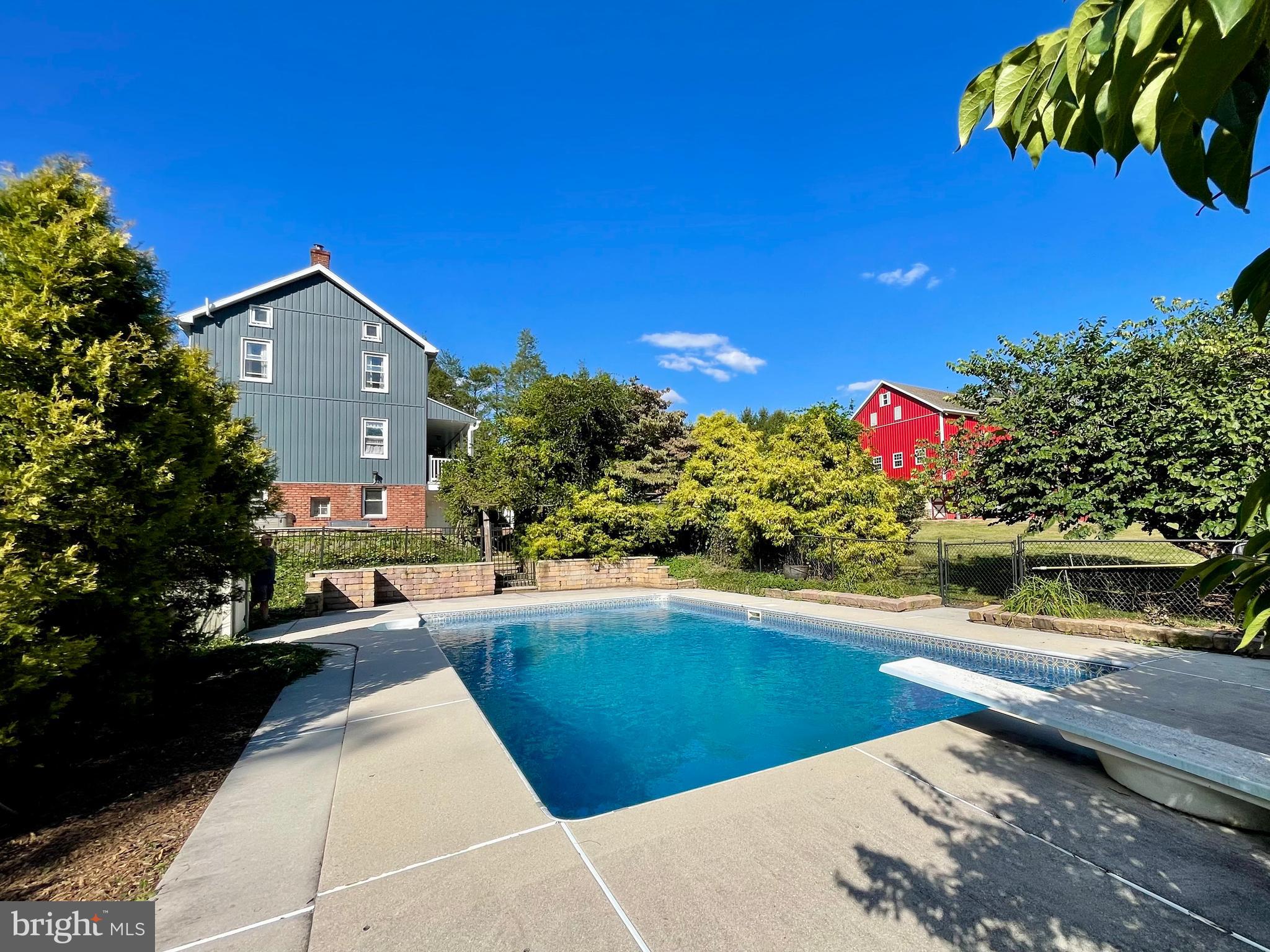 108 Kimberly Drive Hanover, PA 17331 - Photo 32 of 95 a view of a chairs and table in a backyard