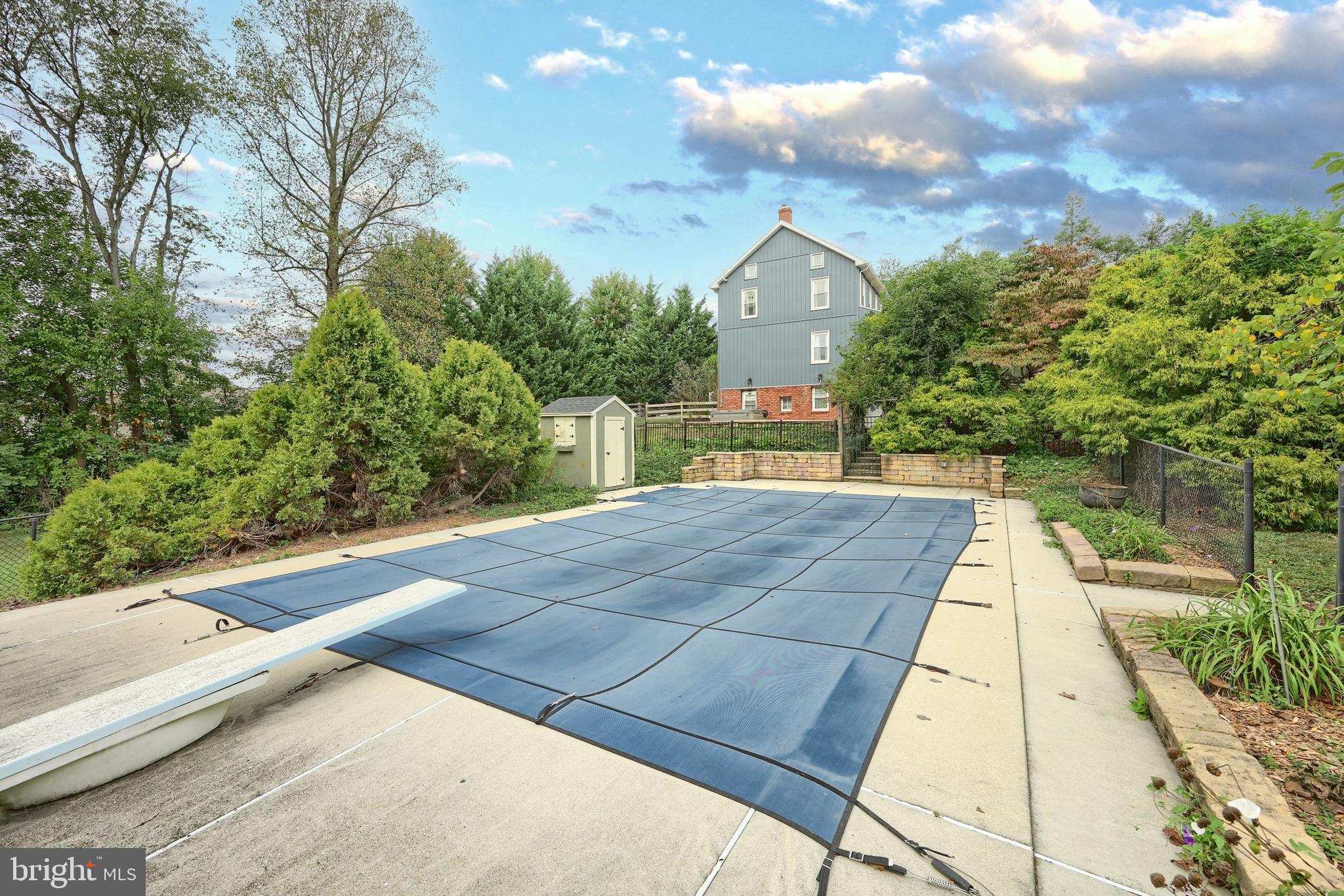 108 Kimberly Drive Hanover, PA 17331 - Photo 34 of 95 a view of backyard with swimming pool and trees in the background