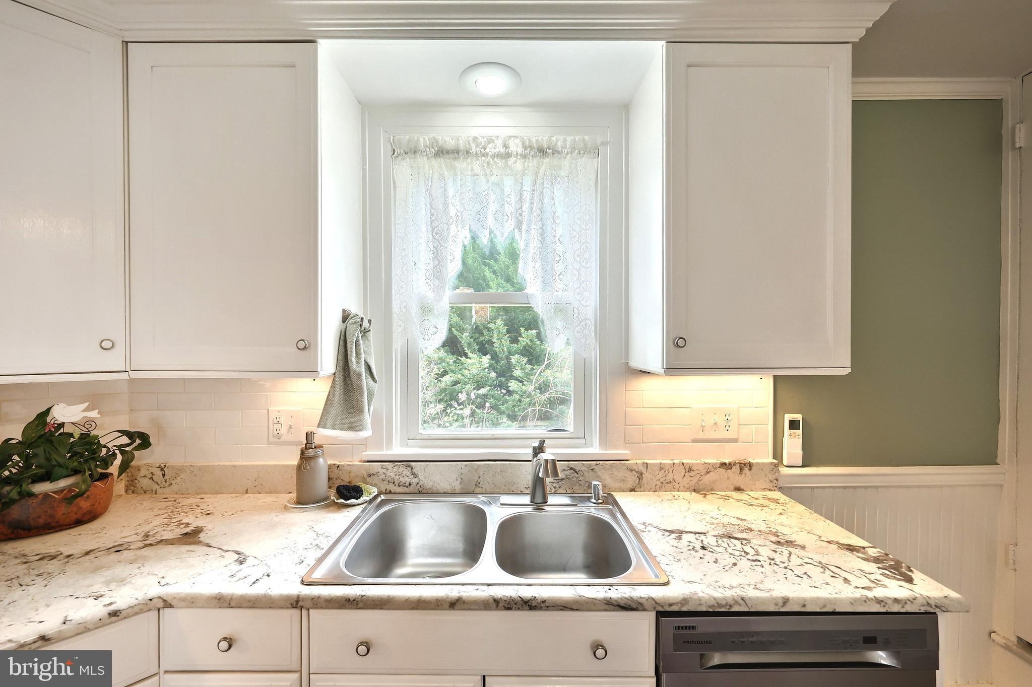 108 Kimberly Drive Hanover, PA 17331 - Photo 54 of 95 a kitchen with granite countertop a sink and a stove