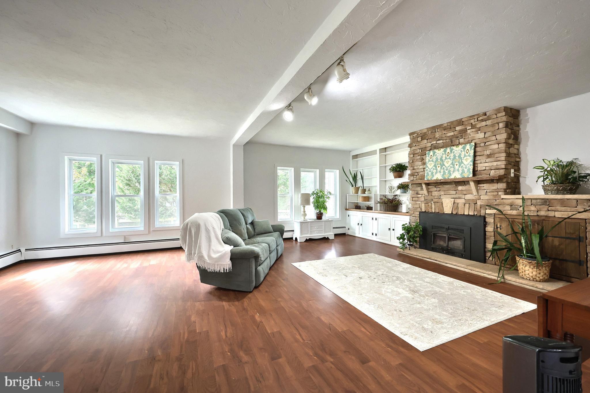 108 Kimberly Drive Hanover, PA 17331 - Photo 59 of 95 a living room with fireplace furniture and a wooden floor