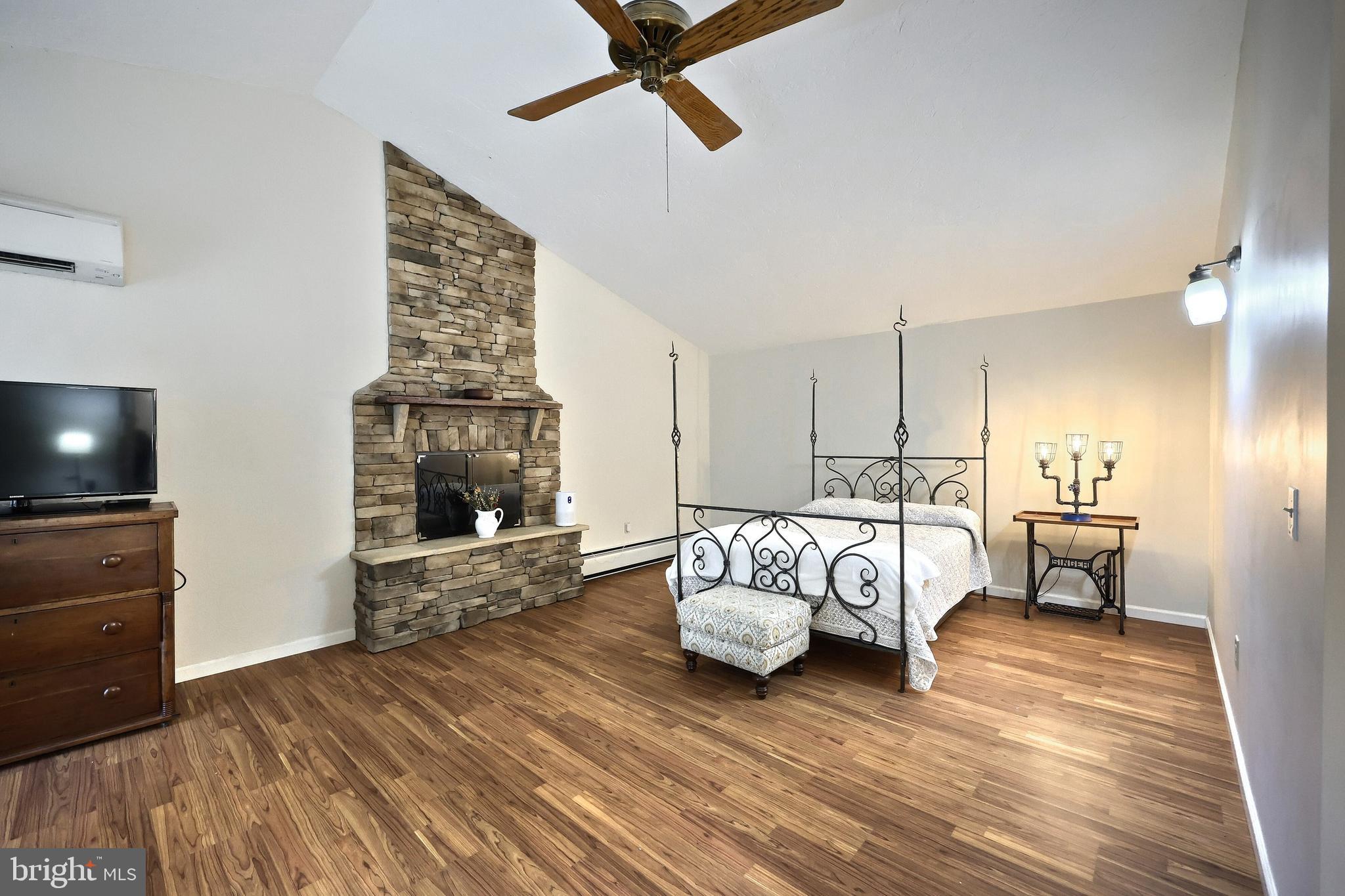 108 Kimberly Drive Hanover, PA 17331 - Photo 76 of 95 a bedroom with furniture and a fireplace