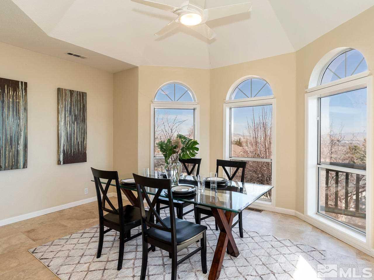 3285 Trumpeter Court Reno, NV 89509 - Photo 13 of 25 a view of a dining room with furniture and a window