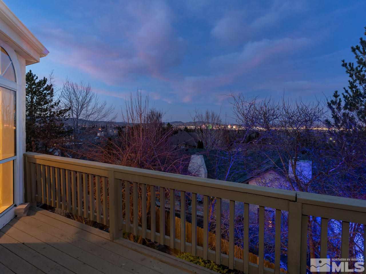 3285 Trumpeter Court Reno, NV 89509 - Photo 3 of 25 a view of a balcony with wooden fence