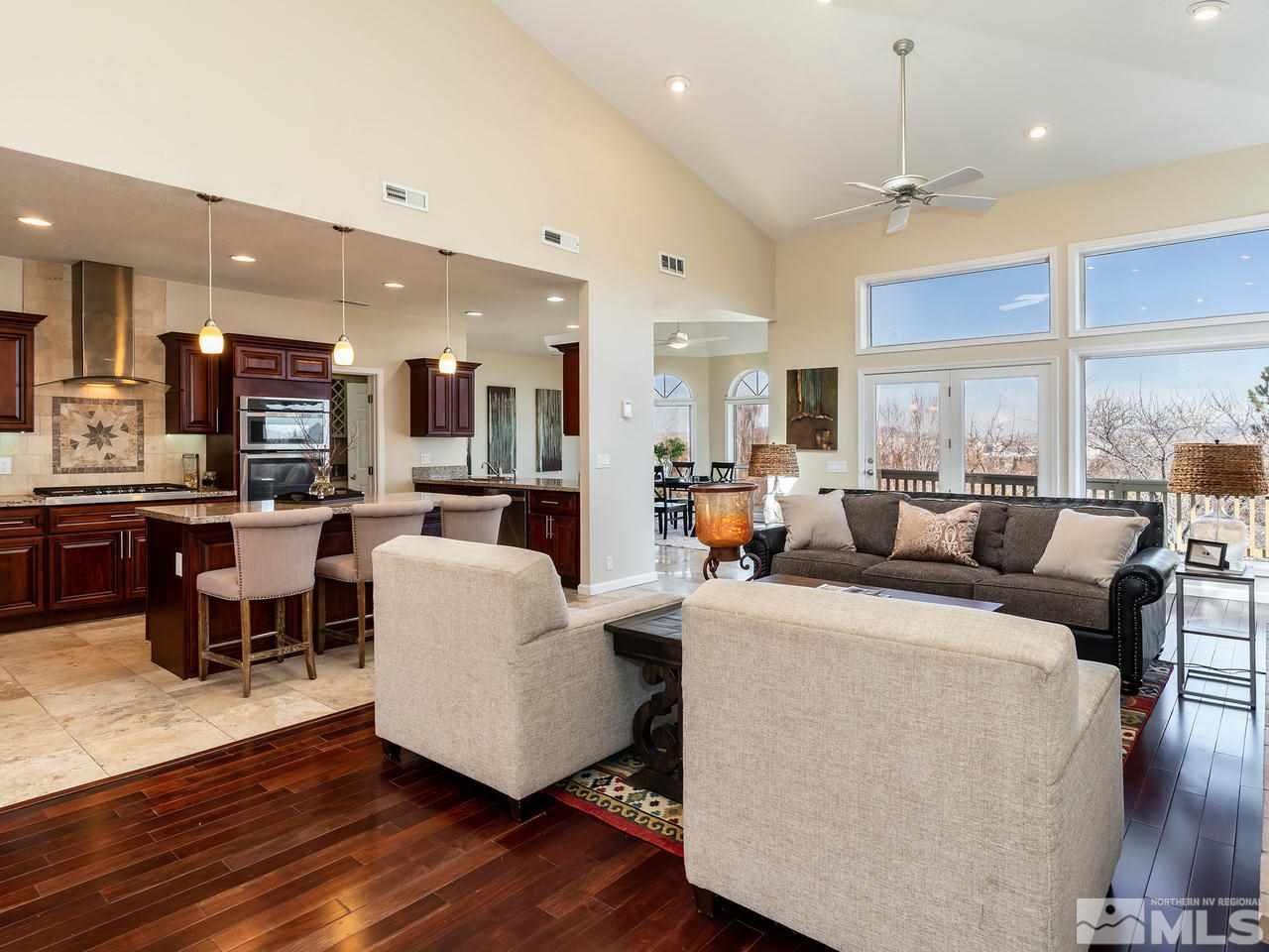 3285 Trumpeter Court Reno, NV 89509 - Photo 9 of 25 a living room with lots of furniture and kitchen view