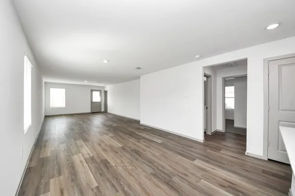 an empty room with windows