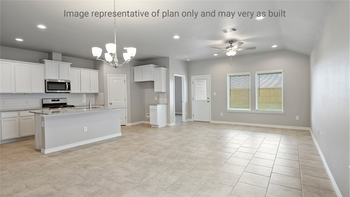 1411 Choctaw Road Sinton, TX 78387 - Photo 4 of 28 a view of a kitchen with a sink cabinets and stainless steel appliances