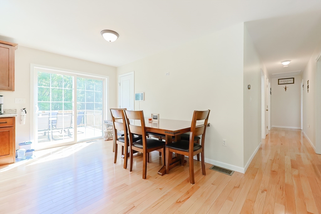 30 Town Farm Road North Brookfield, MA 01535 - Photo 13 of 42 a view of a dining room with furniture and wooden floor