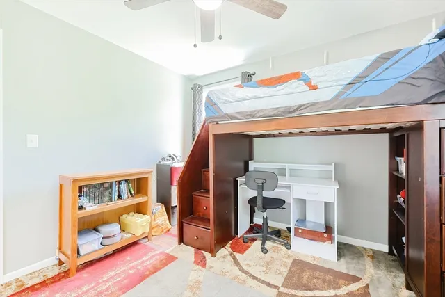 a bedroom with a bed and a walk in closet