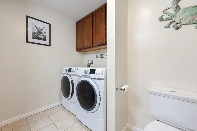 a view of a bathroom with a washer and dryer