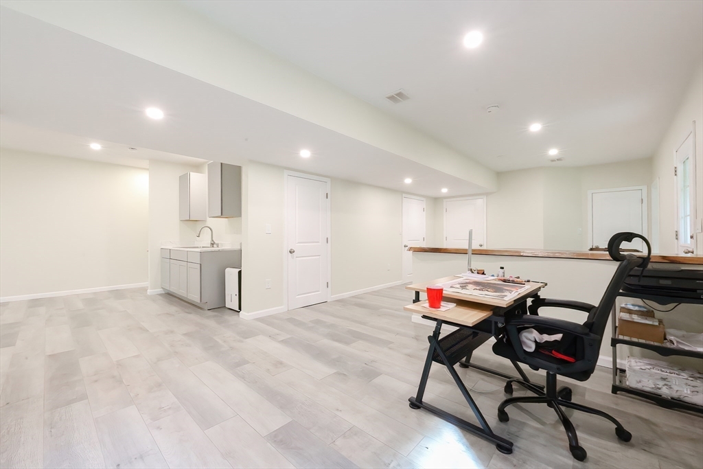 30 Town Farm Road North Brookfield, MA 01535 - Photo 28 of 42 a workspace with furniture and white cabinets