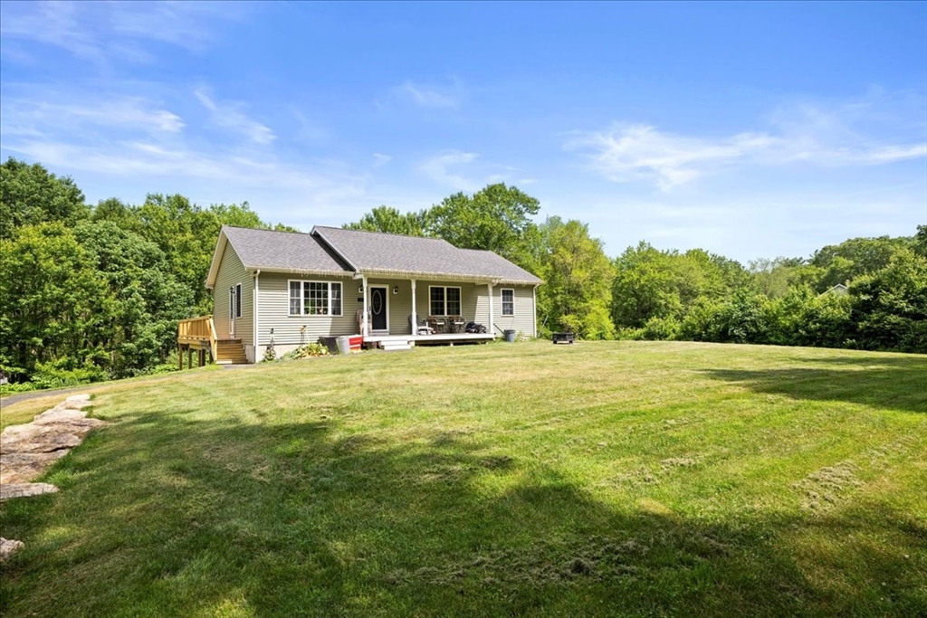 30 Town Farm Road North Brookfield, MA 01535 - Photo 41 of 42 a front view of house with yard and green space