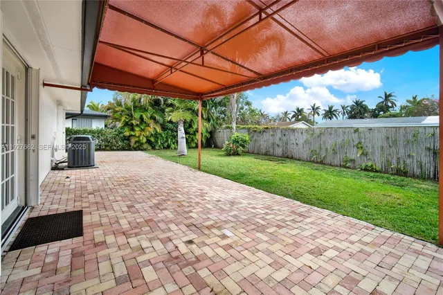 a view of a backyard with a garden