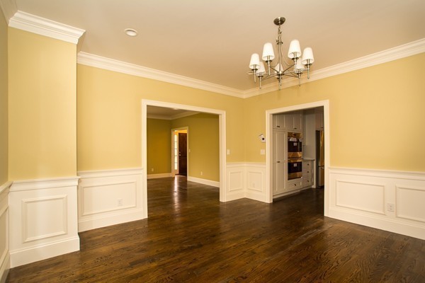14 Winslow Road Wellesley, MA 02481 - Photo 5 of 18 a view of a livingroom with a chandelier