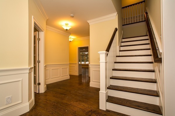 14 Winslow Road Wellesley, MA 02481 - Photo 6 of 18 a view of entryway with wooden floor and stairs