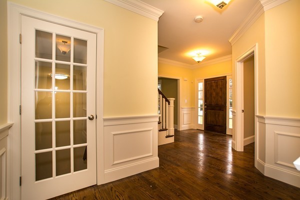 14 Winslow Road Wellesley, MA 02481 - Photo 7 of 18 a view of front door with wooden floor and a window