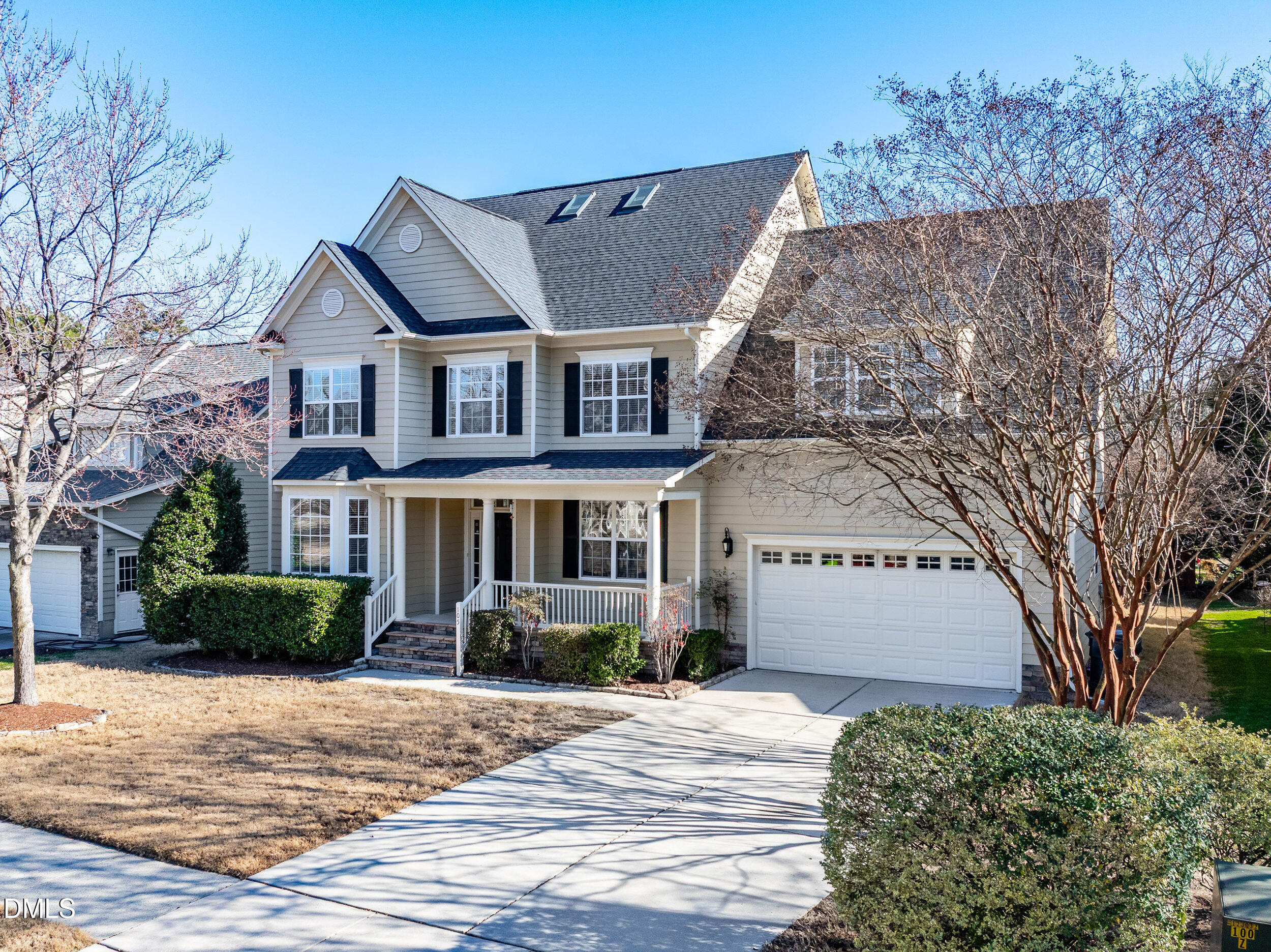105 Bayless Ridge Court Morrisville, NC 27560 - Photo 2 of 42 a front view of a house with a garden