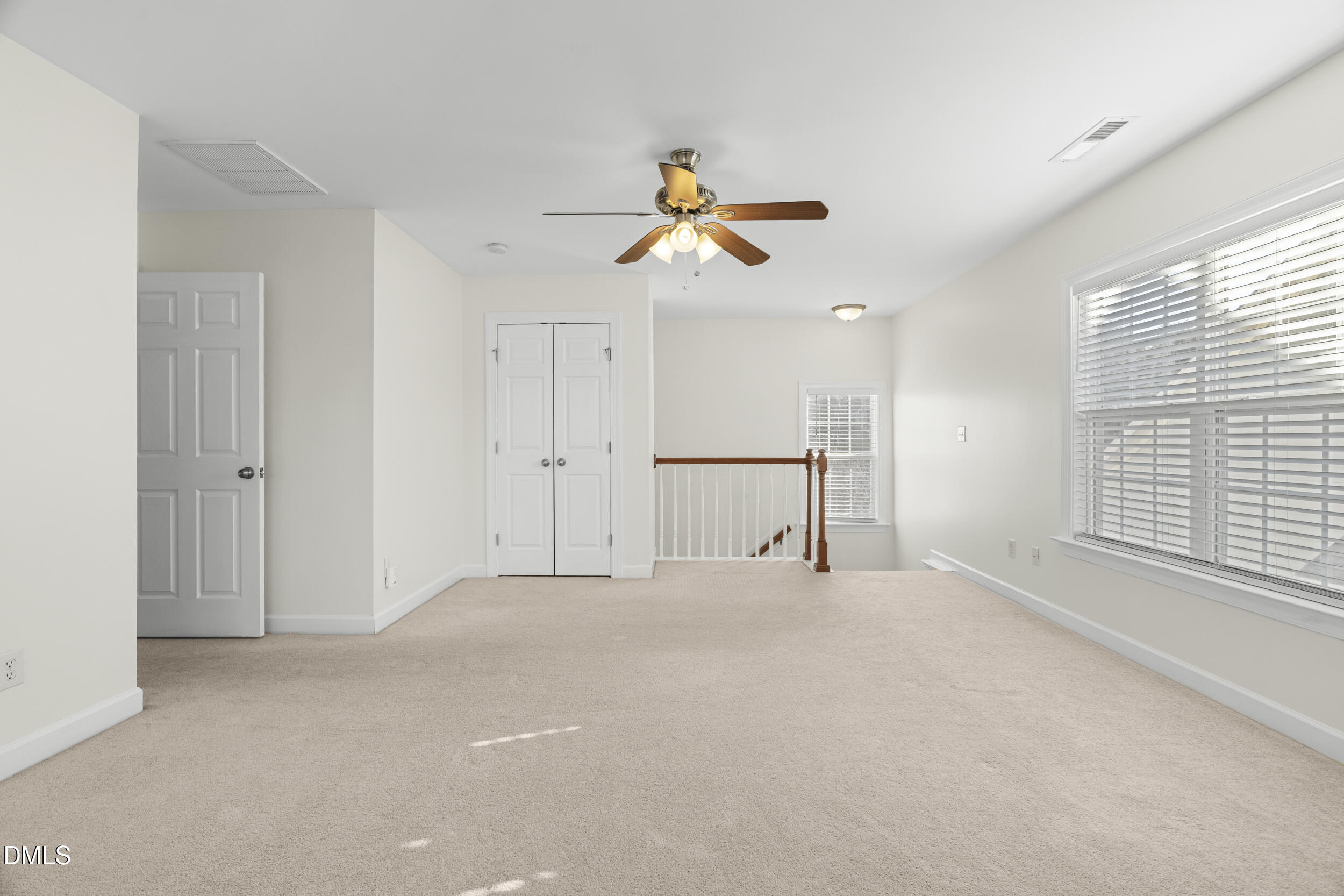 105 Bayless Ridge Court Morrisville, NC 27560 - Photo 23 of 42 a view of empty room with ceiling fan