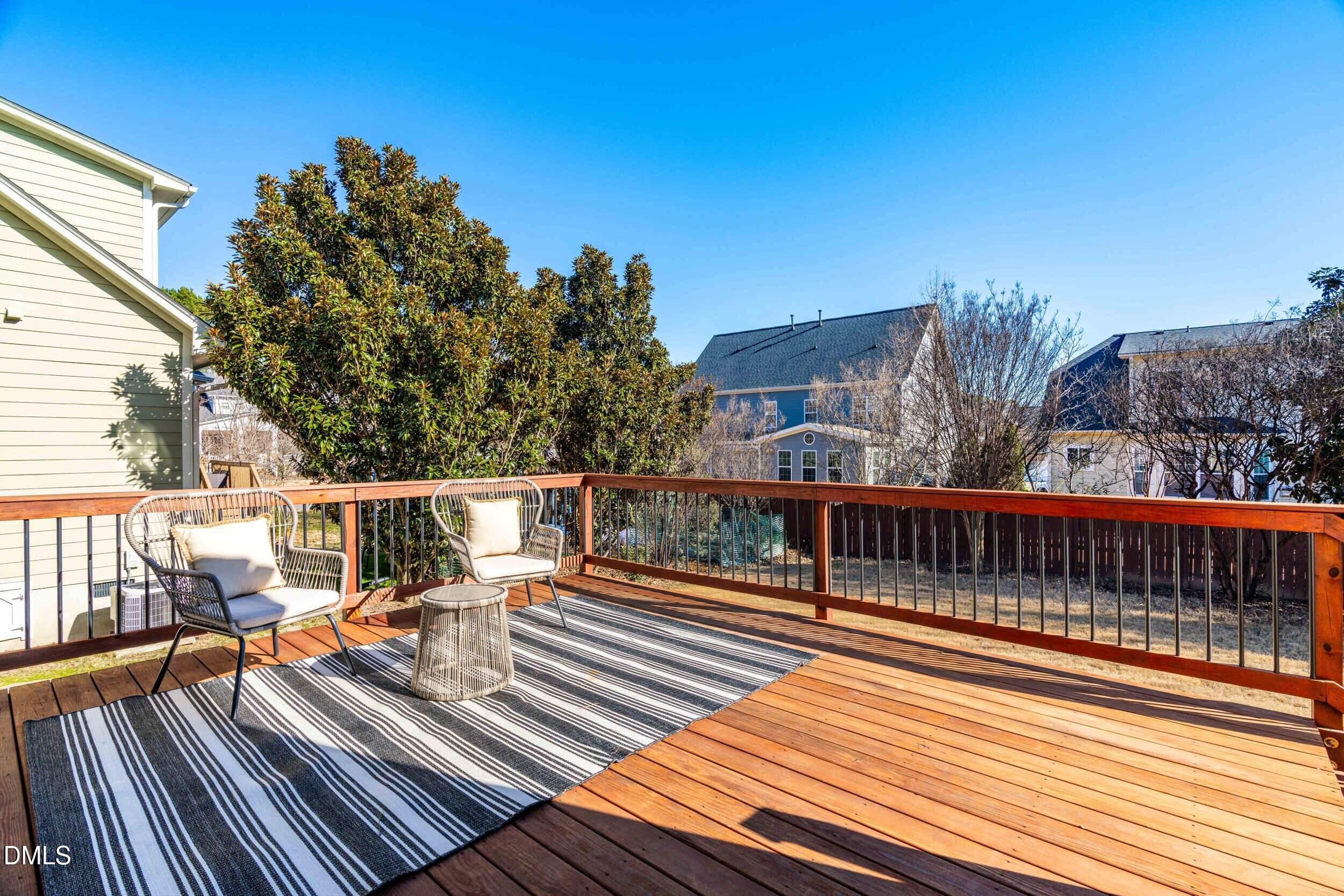 105 Bayless Ridge Court Morrisville, NC 27560 - Photo 38 of 42 a view of balcony with wooden floor and fence