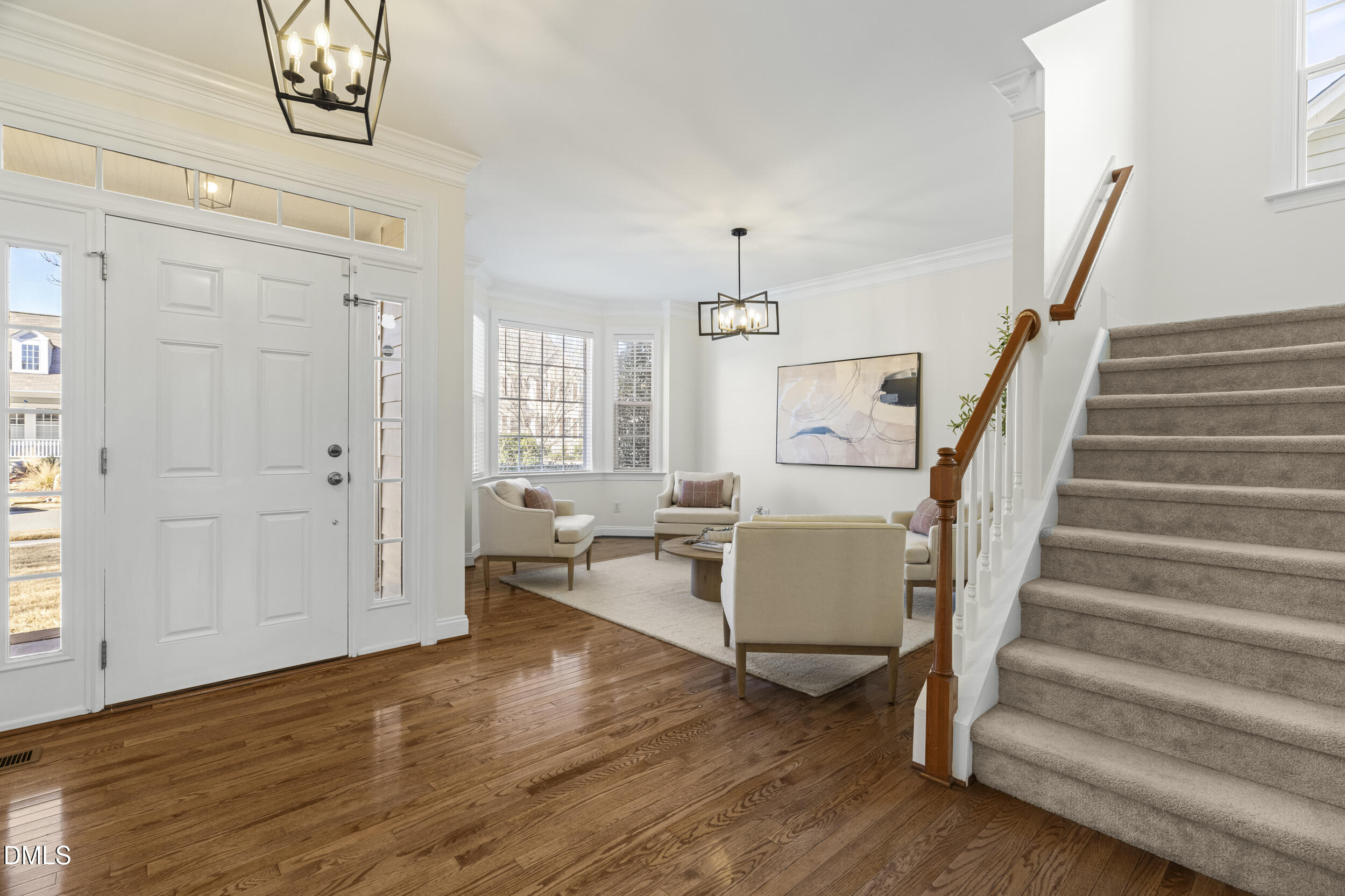 105 Bayless Ridge Court Morrisville, NC 27560 - Photo 5 of 43 a living room with furniture and a wooden floor