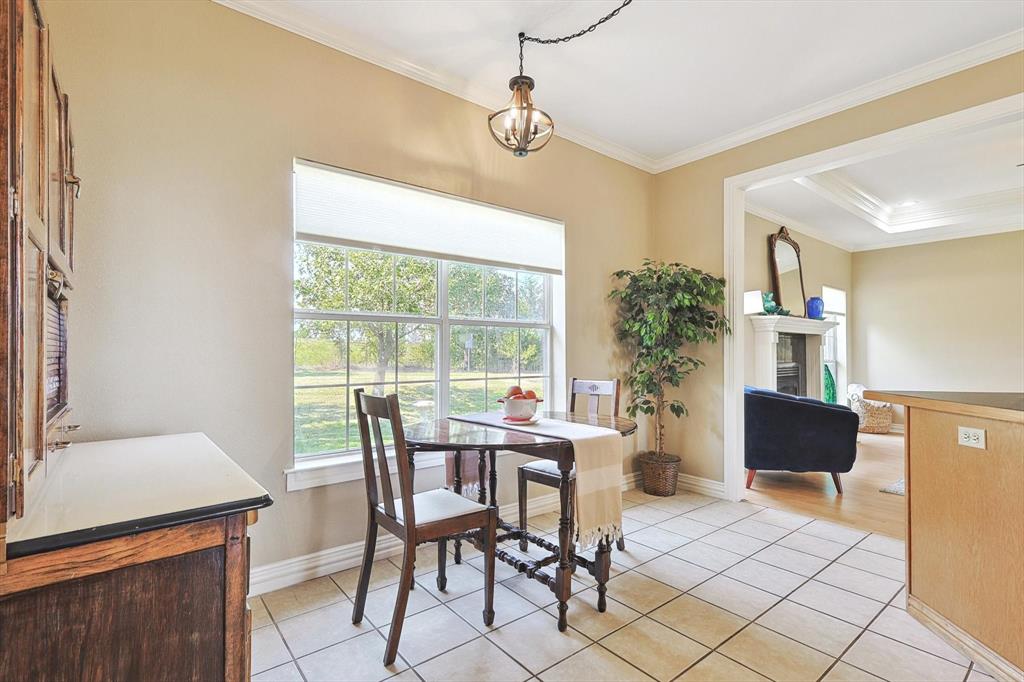 3289 Mitchell Road Krum, TX 76249 - Photo 11 of 38 a view of a dining room with furniture window and outside view