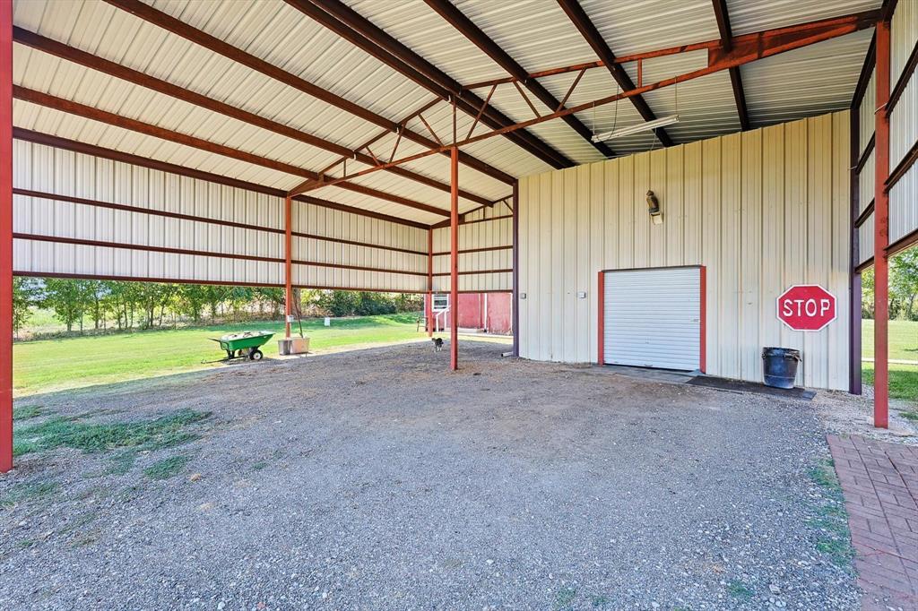 3289 Mitchell Road Krum, TX 76249 - Photo 31 of 38 a view of porch and garage