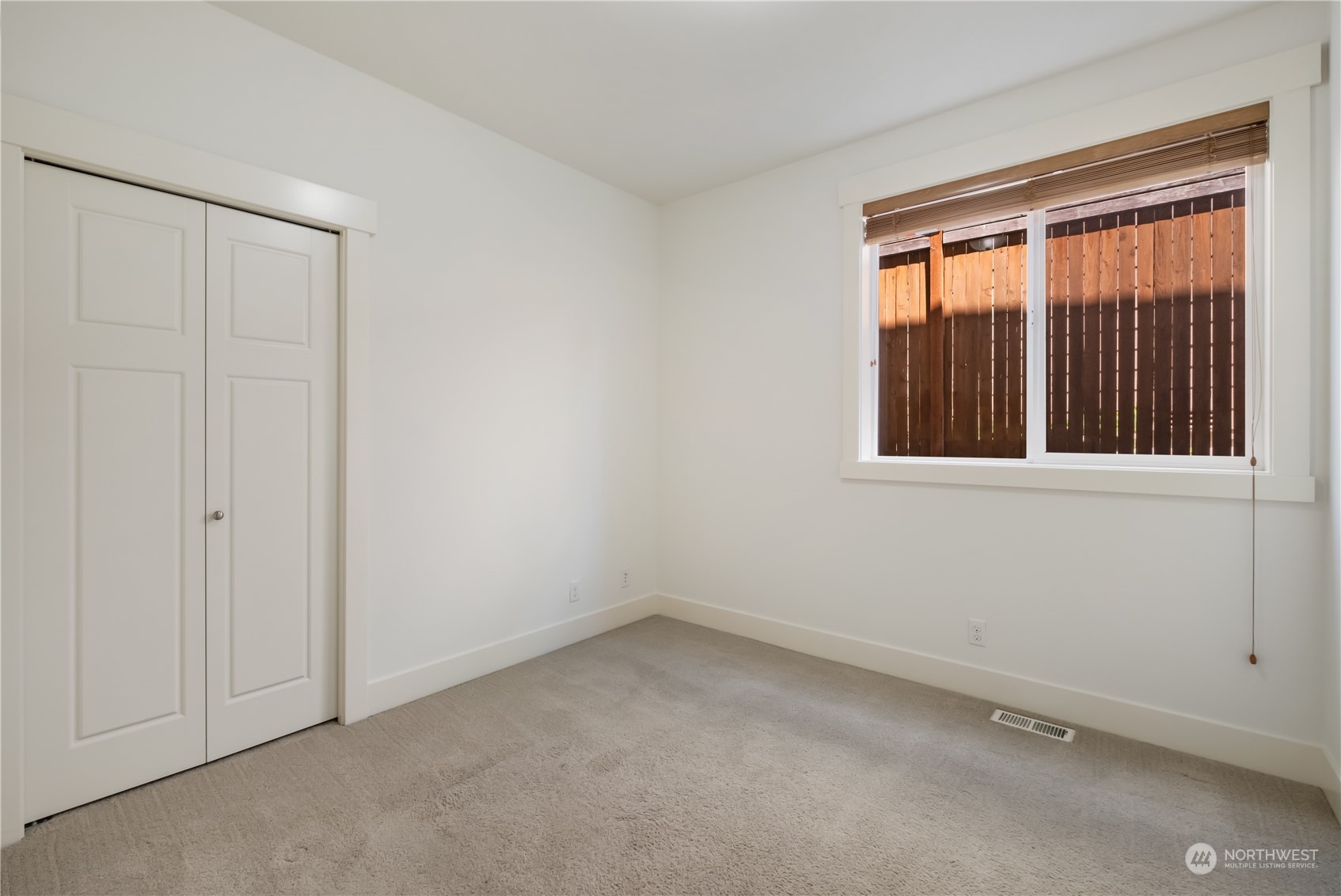 5525 Northeast 7th Place Renton, WA 98059 - Photo 12 of 30 an empty room with windows