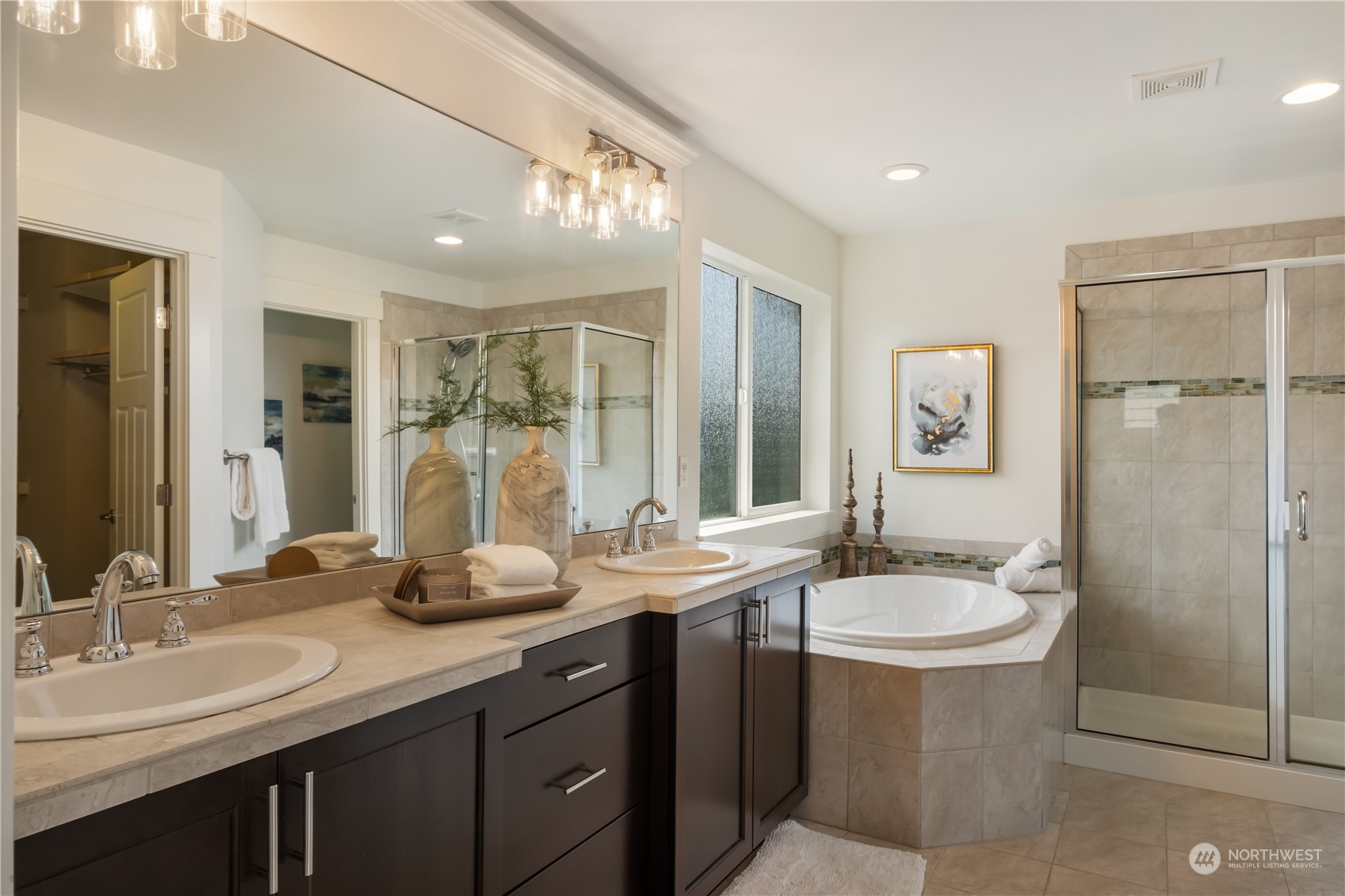 5525 Northeast 7th Place Renton, WA 98059 - Photo 17 of 30 a bathroom with 2 sink and a mirror
