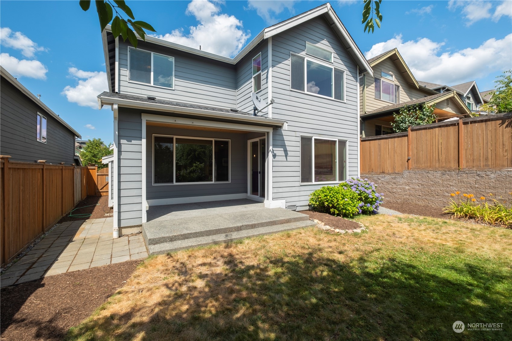 5525 Northeast 7th Place Renton, WA 98059 - Photo 28 of 30 a front view of a house with a yard