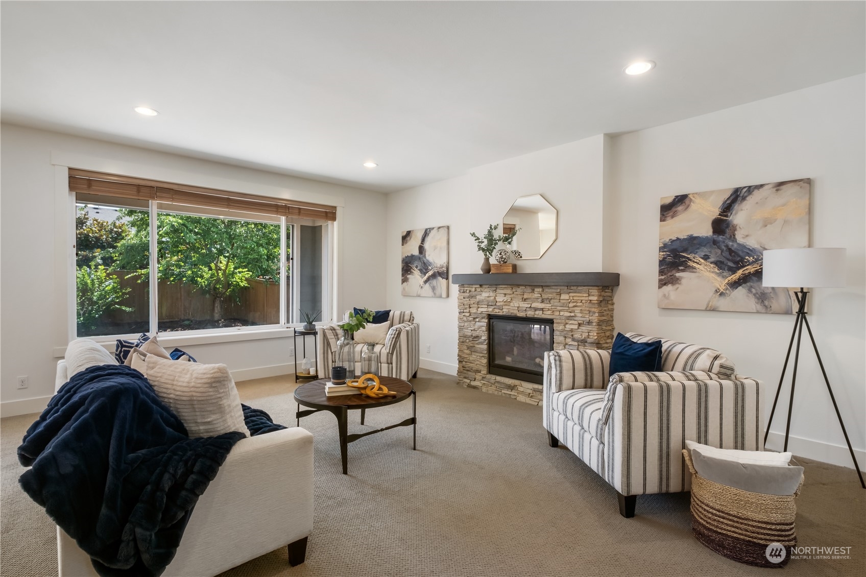 5525 Northeast 7th Place Renton, WA 98059 - Photo 4 of 30 a living room with furniture and a fireplace