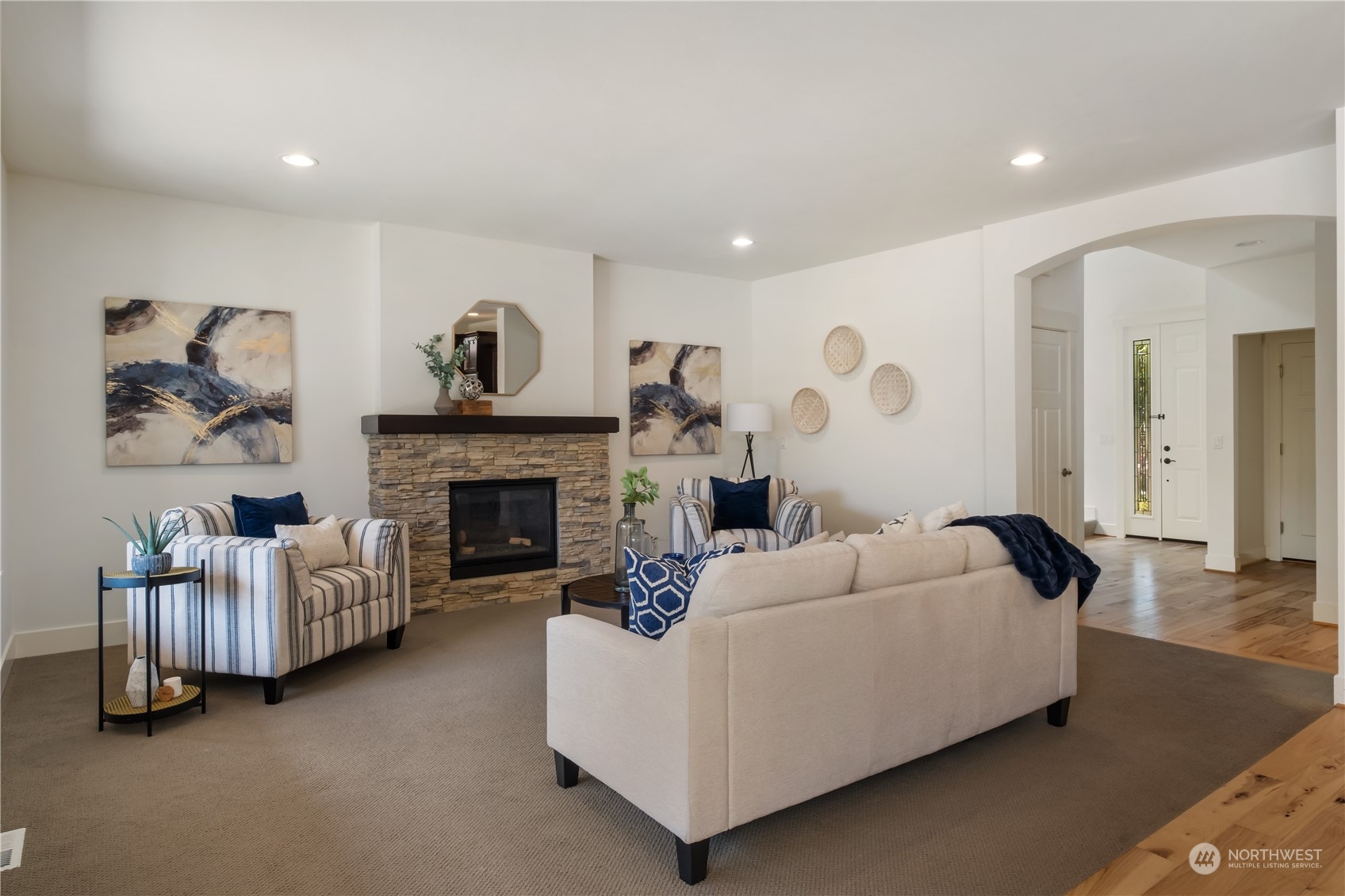 5525 Northeast 7th Place Renton, WA 98059 - Photo 6 of 30 a living room with furniture and a fireplace