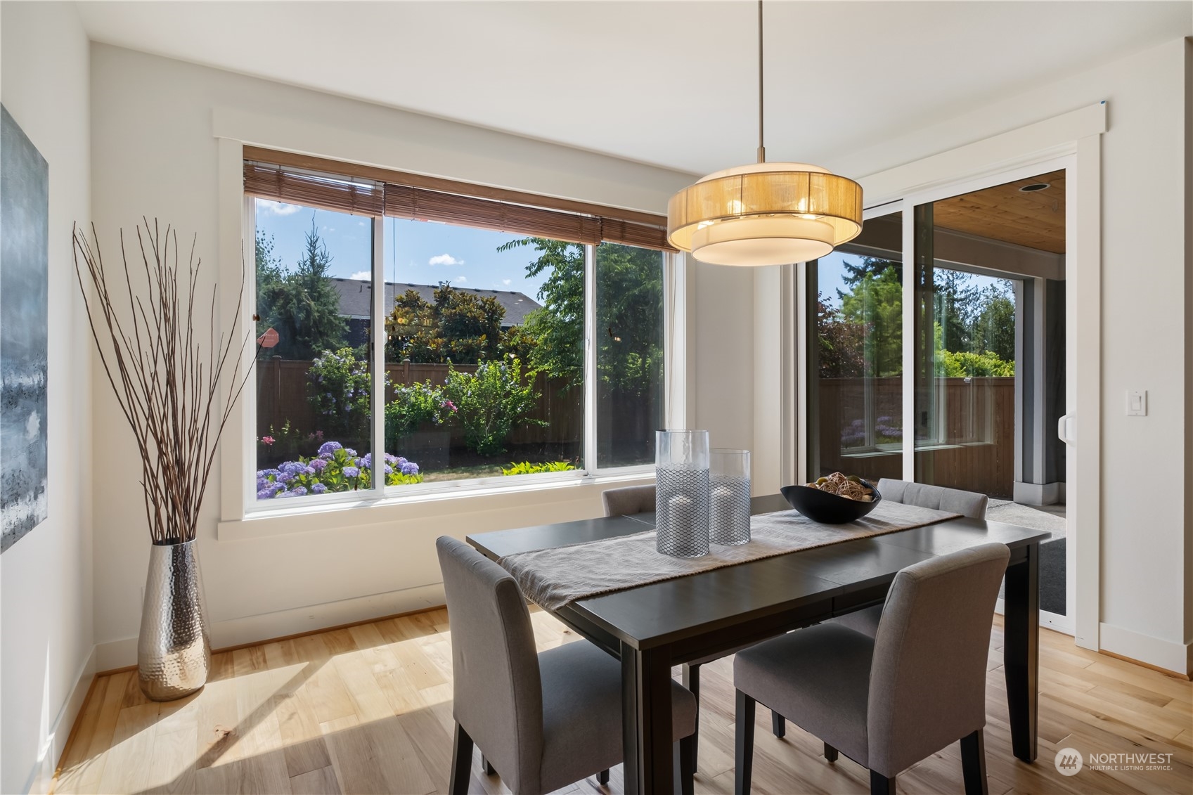 5525 Northeast 7th Place Renton, WA 98059 - Photo 10 of 30 a view of a dining room with furniture window and outside view