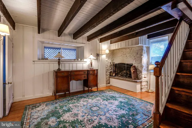 a living room with a fireplace