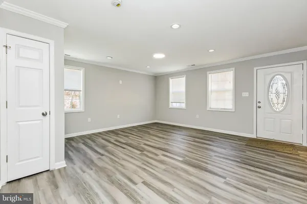 a blue swimming pool is in the middle of a yard