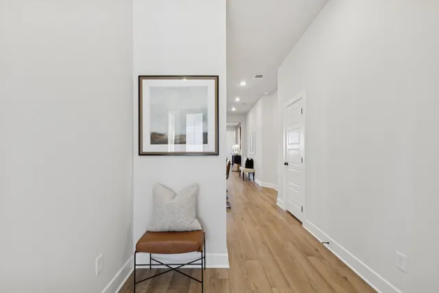 a view of a big yard next to a large tree