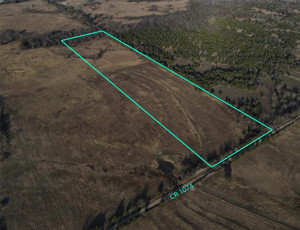 1074 Celeste Tx 75423 Celeste, TX 75423 - Photo 3 of 3 a view of a backyard