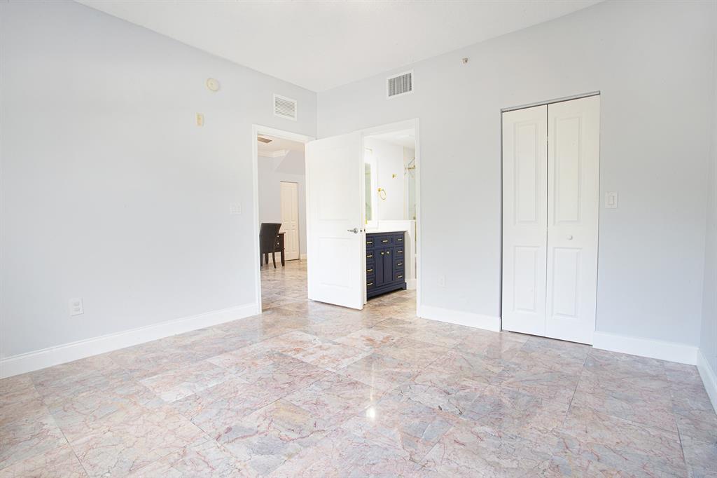 5860 West Sample Road, Unit 204 Coral Springs, FL 33067 - Photo 21 of 36 a view of an empty room
