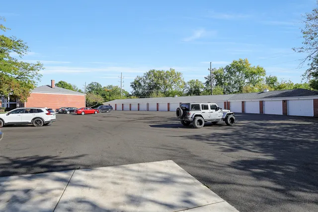 a view of a building with a yard