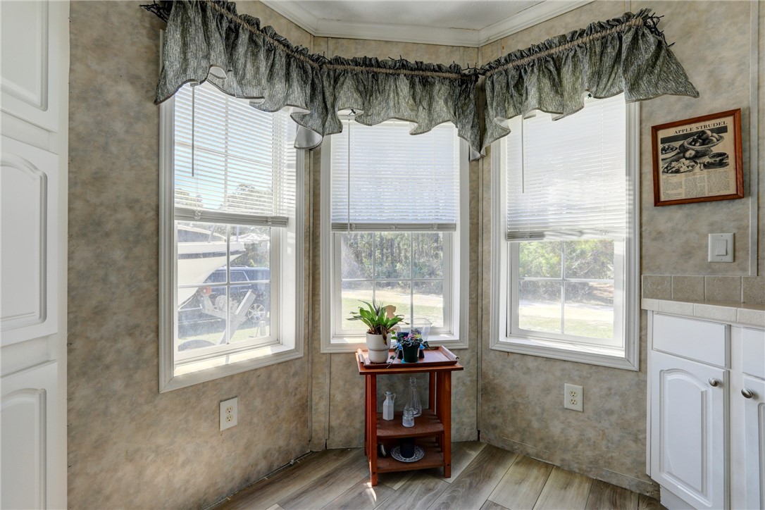 7820 Russell Street Sebastian, FL 32958 - Photo 15 of 36 a view of a livingroom with furniture and windows