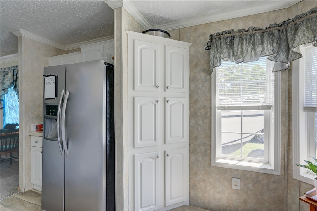 7820 Russell Street Sebastian, FL 32958 - Photo 16 of 36 a view of walk in closet with window