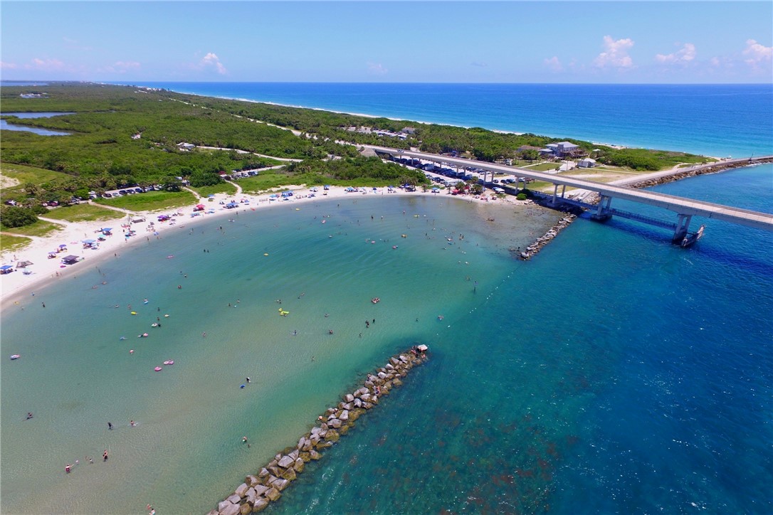 7820 Russell Street Sebastian, FL 32958 - Photo 31 of 36 a view of an ocean and a yard