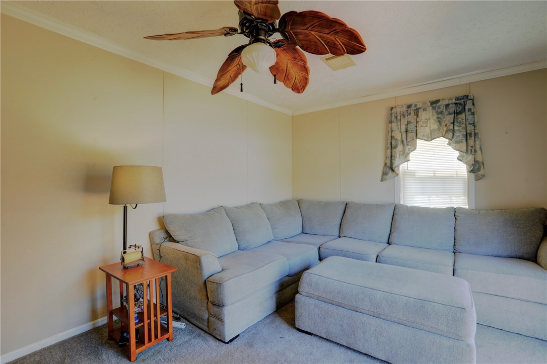 7820 Russell Street Sebastian, FL 32958 - Photo 8 of 36 a living room with furniture