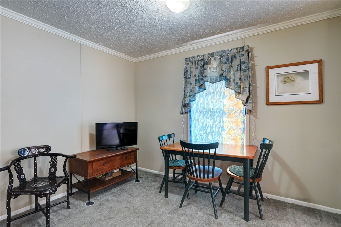 7820 Russell Street Sebastian, FL 32958 - Photo 9 of 36 a view of a livingroom with furniture and a window