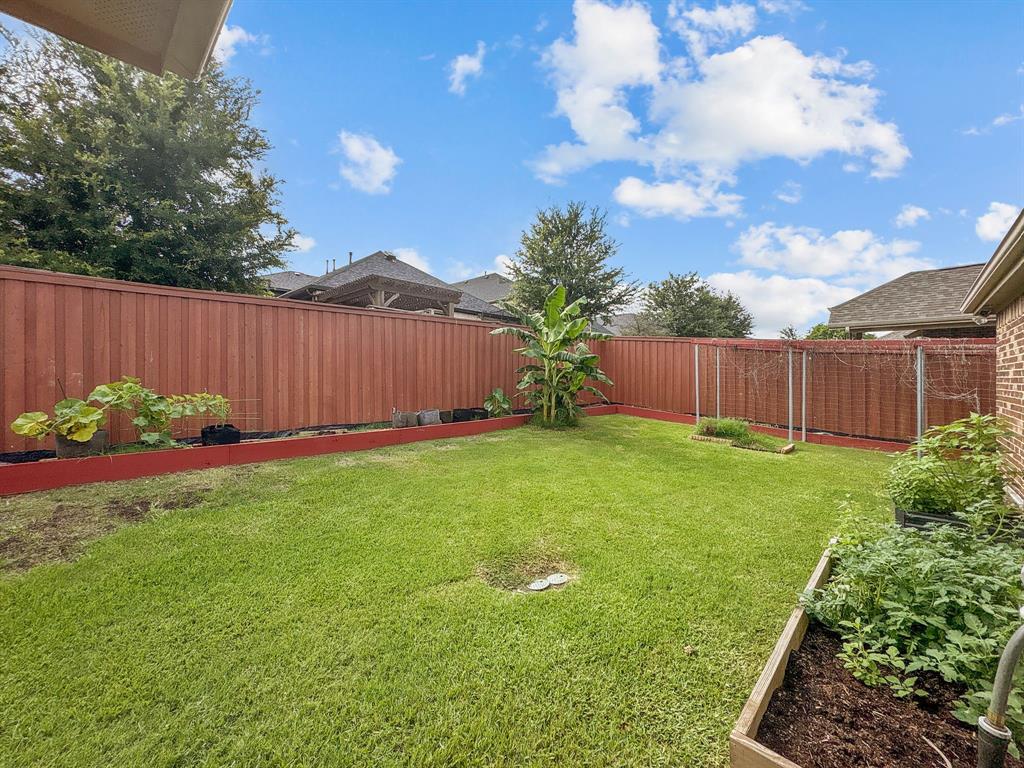 3205 Ridgeway Drive McKinney, TX 75071 - Photo 26 of 27 a garden view