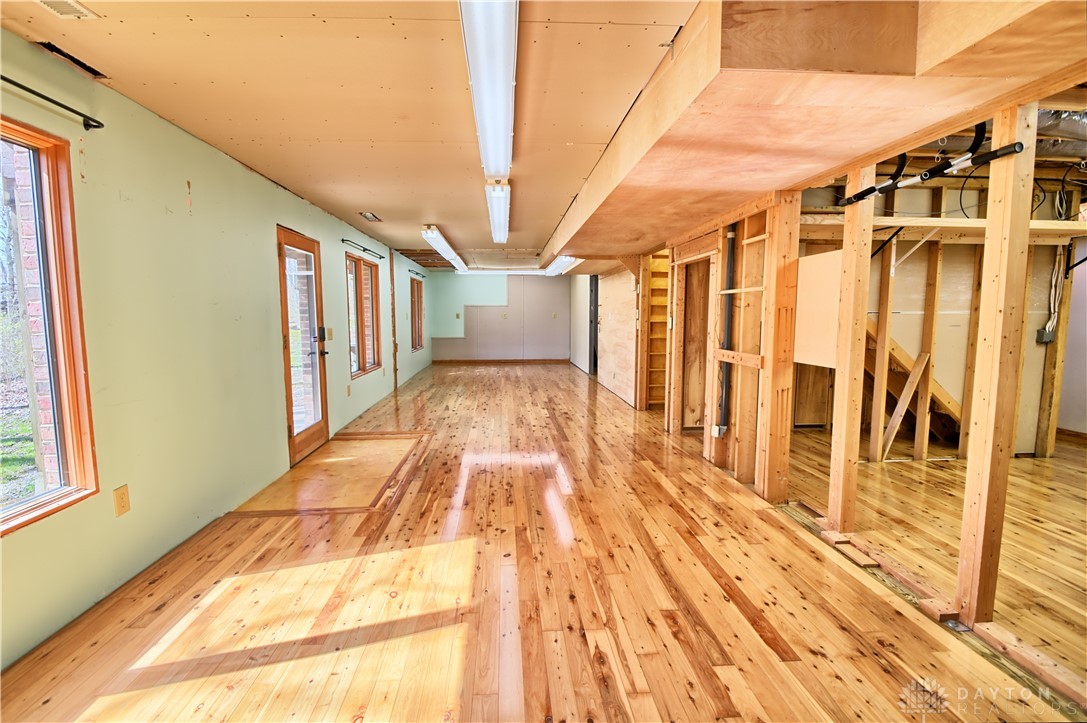 8711 Nicole Lane Springboro, OH 45066 - Photo 65 of 87 This spacious interior offers an abundance of natural light and features beautiful hardwood flooring.