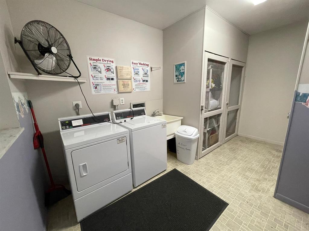 250 Northeast 20th Street, Unit 210 Boca Raton, FL 33431 - Photo 48 of 50 a utility room with dryer and washer