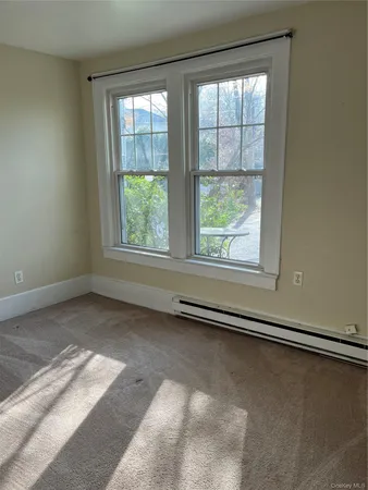 an empty room with a window