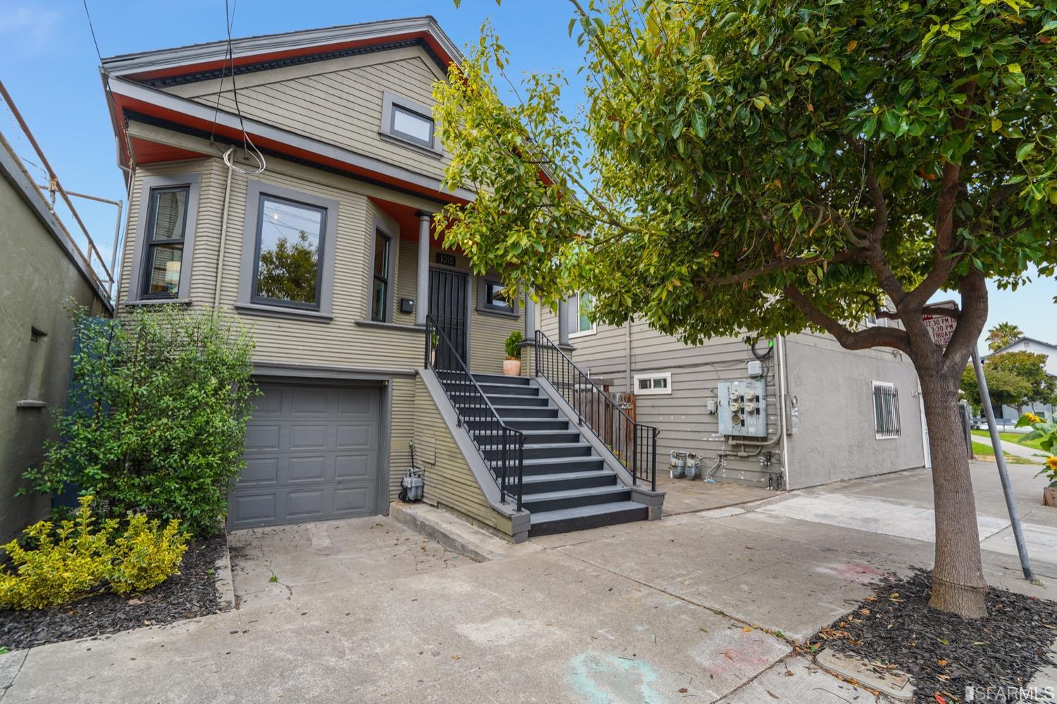 1015 26th Street Oakland, CA 94607 - Photo 2 of 33 a view of a house with a yard